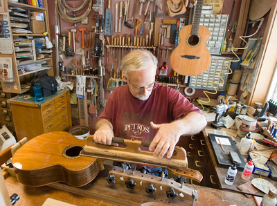 Petros Guitars: In The Shop  dressing the board